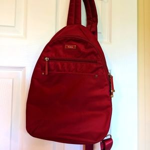 Tumi red shoulder backpack
